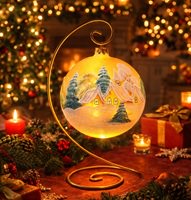 mundblæst julekugle i guld glas med vintermotiv